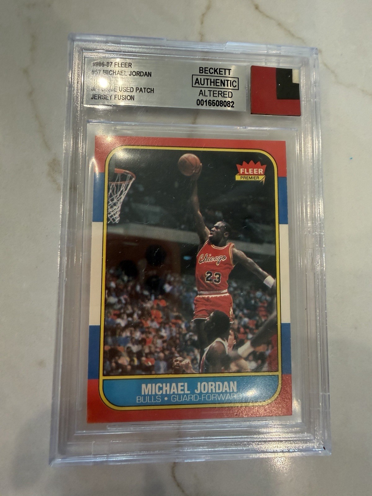 1986-87 Fleer - Michael Jordan #57 (RC) Jersey Fusion Authentic Altered Rookie view 3