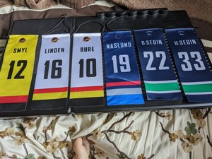 canucks retired jerseys