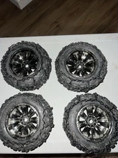 Proline Trencher 3.8" tires and rims. 17mm hex Black Chrome Rims W/ Chains RC