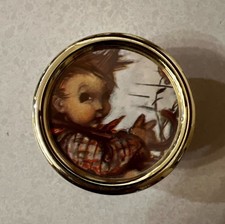Vintage Swiss Music Box Brahms Lullaby Hummel Style Child Gold Tone Round on The Hot Collector