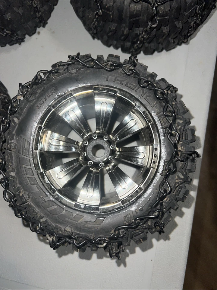 Proline Trencher 3.8" tires and rims. 17mm hex Black Chrome Rims W/ Chains RC - Image 2 of 4