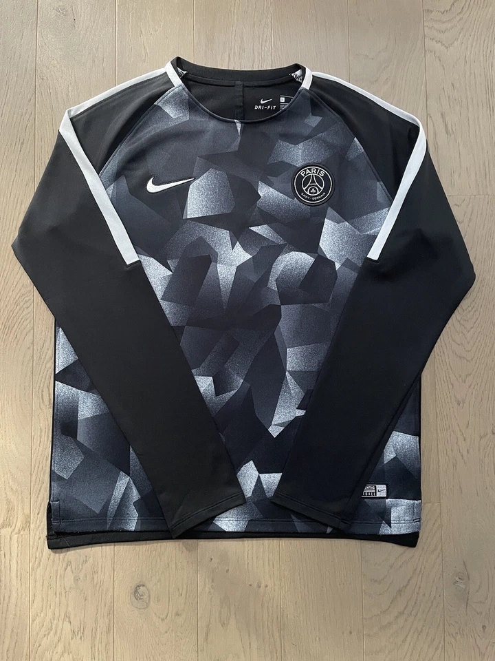 Maillot d’entraînement NIKE (équipe du PSG) taille L (12/13 ans) neuf - Photo 1/2
