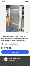 sub zero refrigerator awesome looking original woodworking on the front face