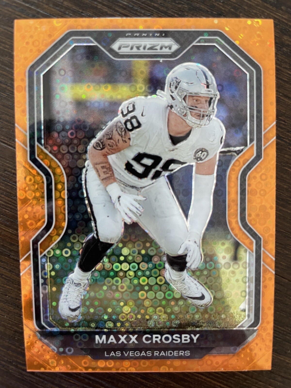 Maxx Crosby 2020 Panini Prizm Orange Disco Prizm Parallel Football Card # 136