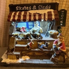 Christmas Skates & Sleds Repair Stand Figurine Village Accessory Lights Up Works