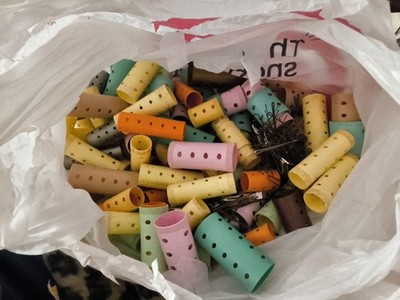 These items are magnetic hair rollers (or curlers), commonly used for setting...