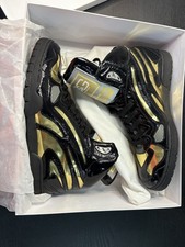 Scarpe alte Dolce e Gabbana nere e oro taglia 11