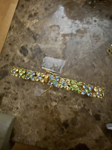joan rivers bracelet line with green and yellow Swarovski crystals