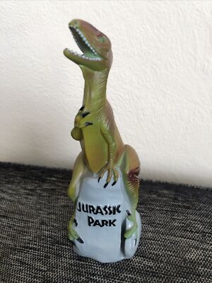 JURASSIC PARK VELOCIRAPTOR BATH SALTS CONTAINER. FULL, UNUSED 1992