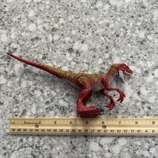 Jurassic World Camp Cretaceous Savage Strike Velociraptor action figure.