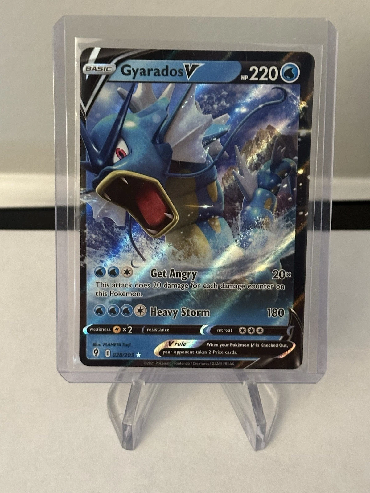 A miscut Pokemon card showing part of the neighboring card