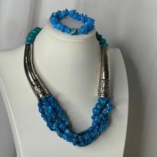 Turquoise blue colored and silver tone necklace and bracelet set southwestern