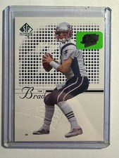 K243,636 - 2002 SP Authentic #1 Tom Brady