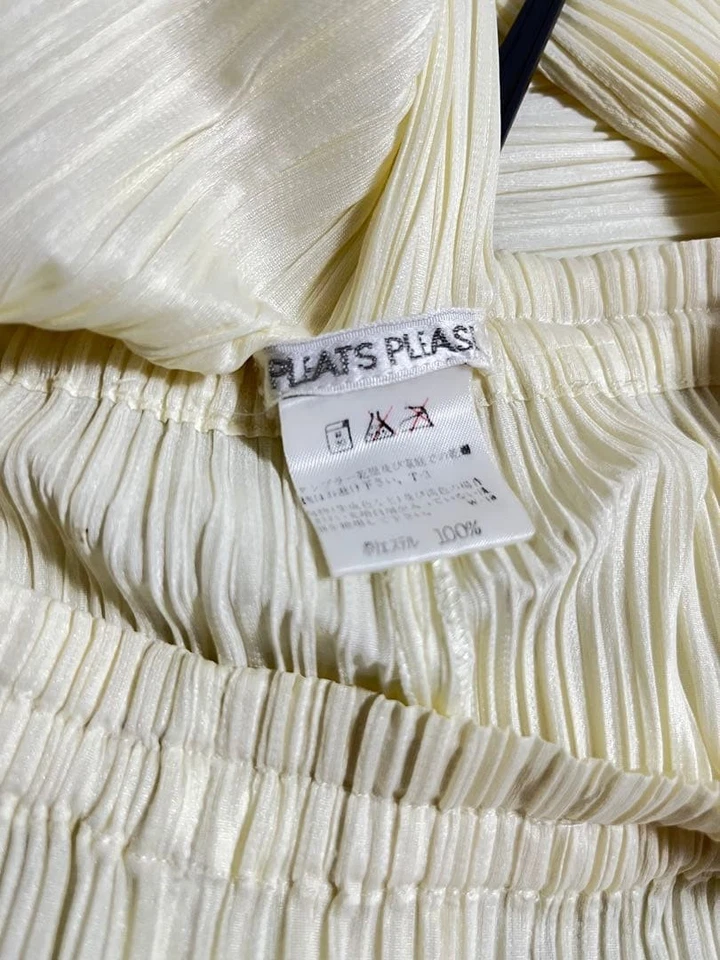 PANTALONES PLISADOS ISSEY MIYAKE USADOS, TALLA M, CREMA BUENOS Foto 2 de 4