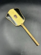 Vtg Art Deco beveled hand mirror brass frame black and yellow celluloid back