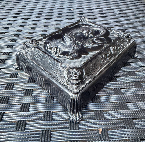 Silver Cruver Chicago Celluloid Dragon trinket box with raised-on lid featuring detailed dragon and cloud design.