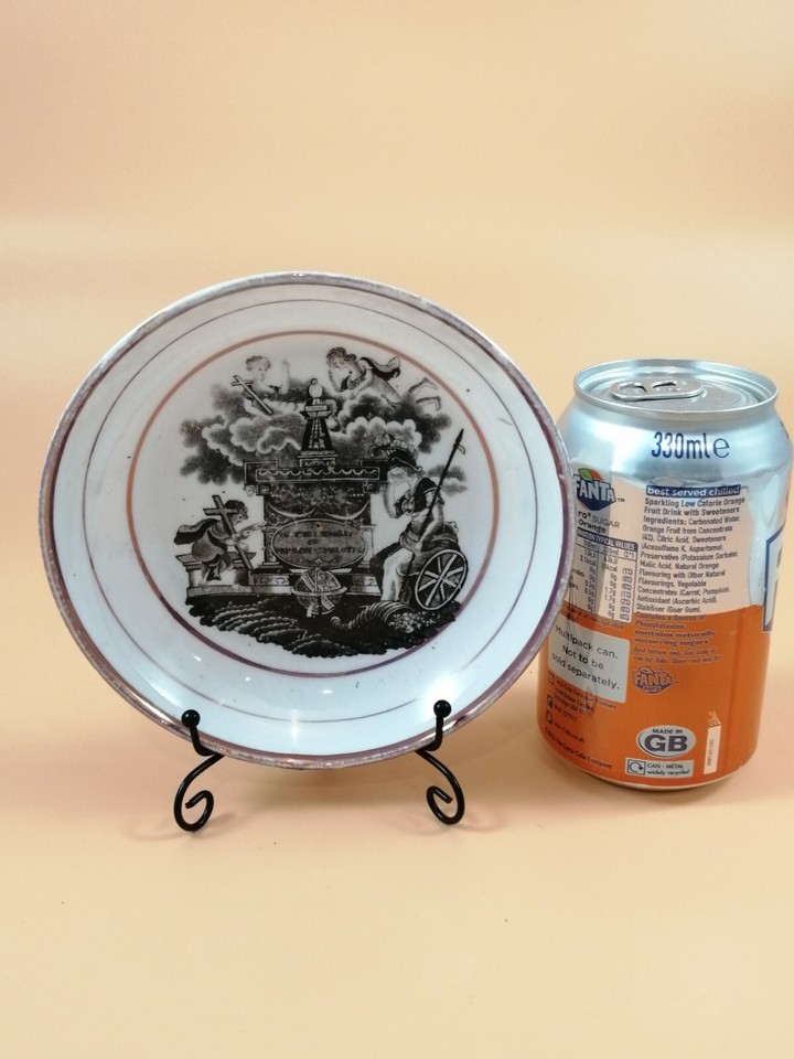 Two antique Staffordshire commemorative Princess Charlotte pink lustre