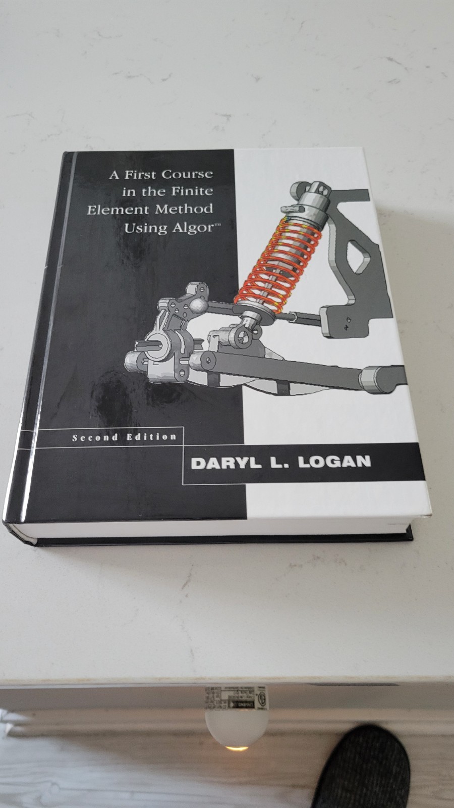First Course in the Finite Element Method Using Algor by Daryl L. Logan...