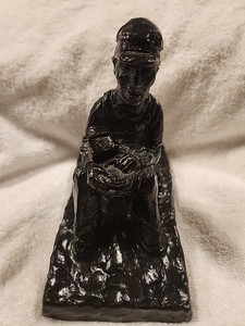 A JCK Specialty Coal Miner Figure
