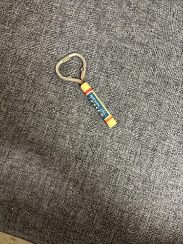 Vintage Yesser It’s Esser Bottle Opener Plastic Handle Advertisement