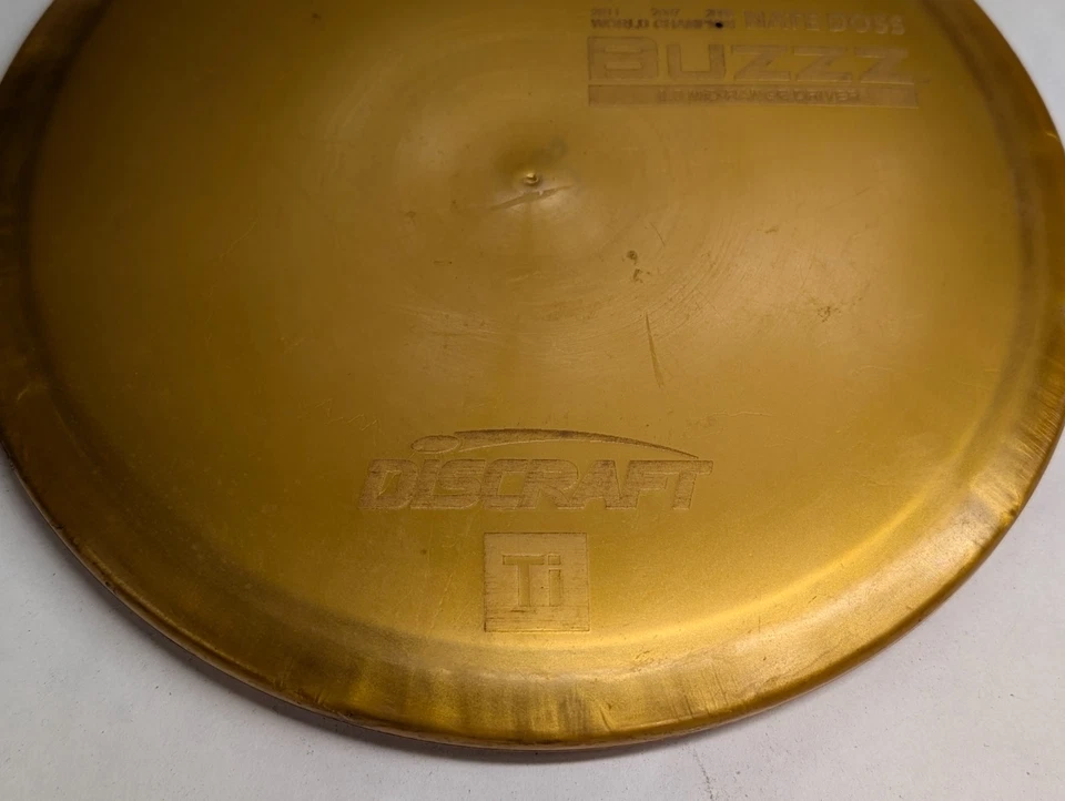 Discraft Ti BUZZZ Midrange Driver Disc Golf Titanium 178g Gold Nate Doss 3x - Image 2 of 4