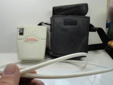 Beige used Frabill Bait Station Aerator with hose case; battery operated