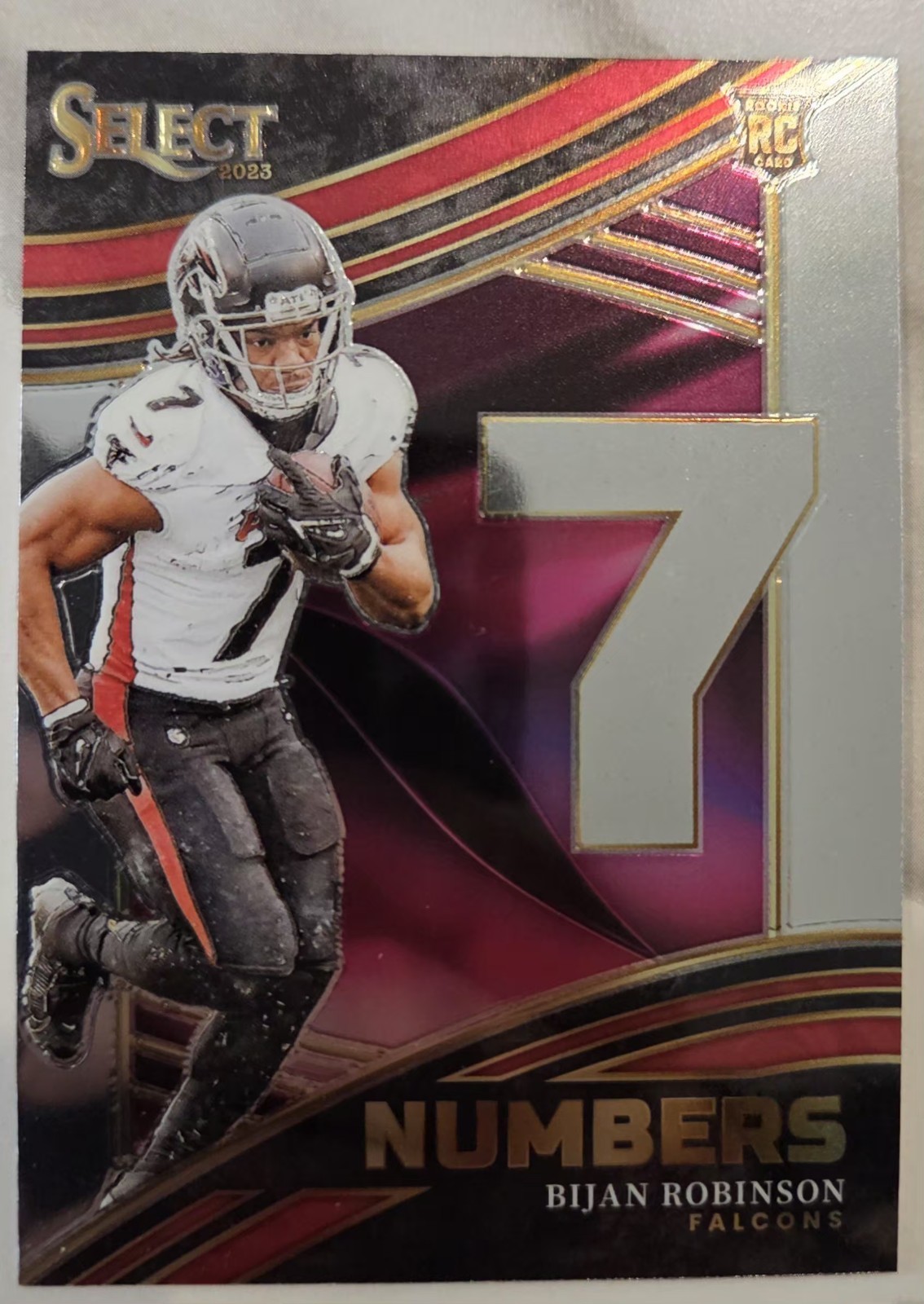 2023 Panini Select - Select Numbers Bijan Robinson #NMB-BRO Silver Prizm (RC)