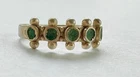 Vintage sterlling silver ring featuring five turquoise stones