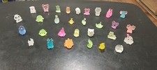 set of 4 glow in the dark plastic mini animal figures. , multi colors.