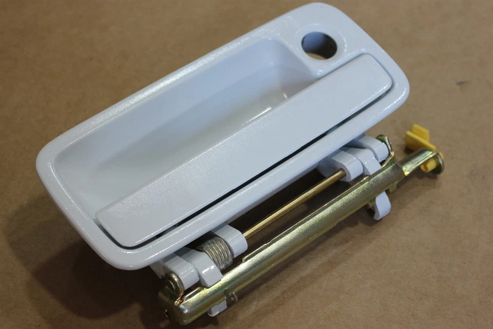 Manija exterior de puerta de pasajero Dodge Caravan 92-95 0JB00LW7 blanca OEM de fábrica Foto 2 de 4