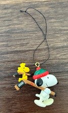 2000 Hallmark Snoopy & Woodstock carrying Hockey Sticks Christmas Ornament
