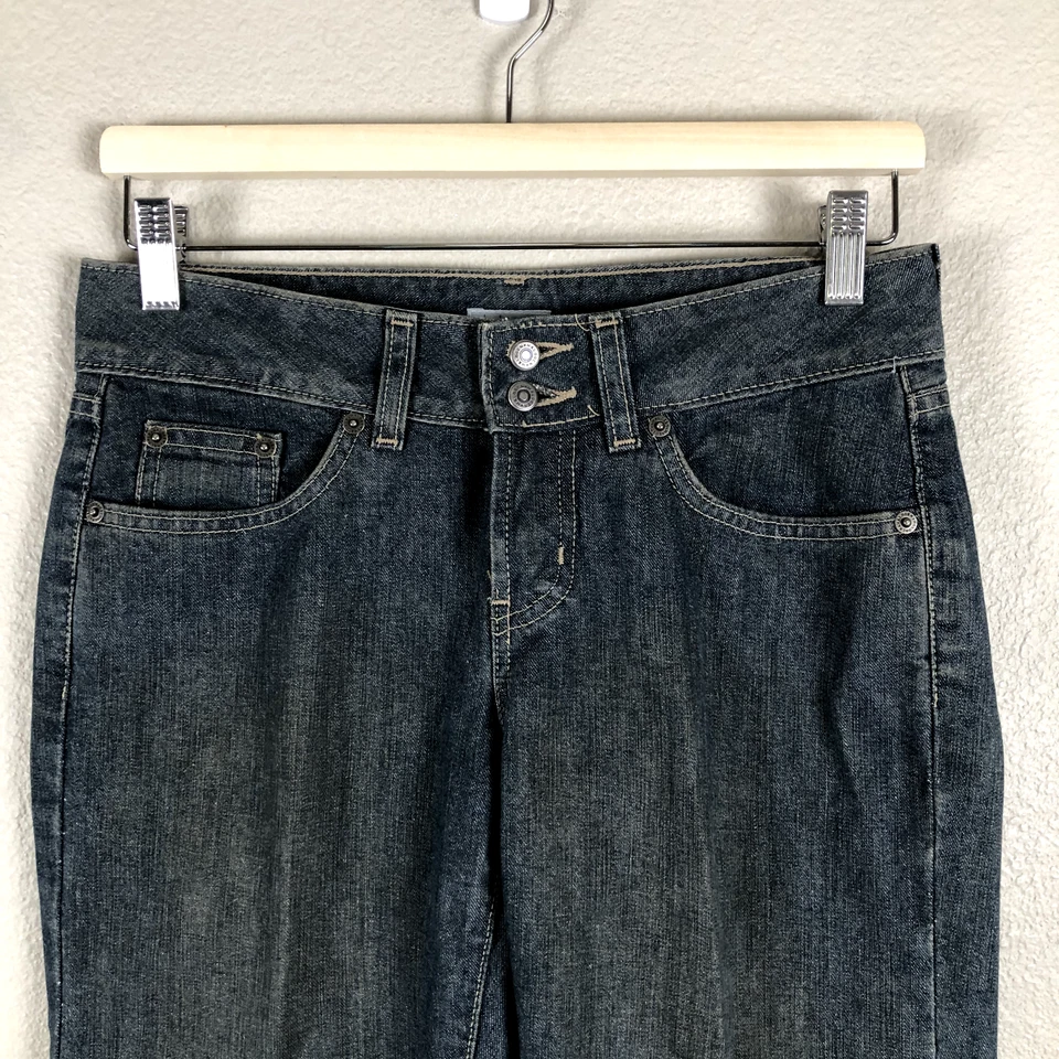 Pantalones de mezclilla halógenos para mujer 2 azules lavado medio botín tiro bajo moda occidental tendencia Foto 3 de 4