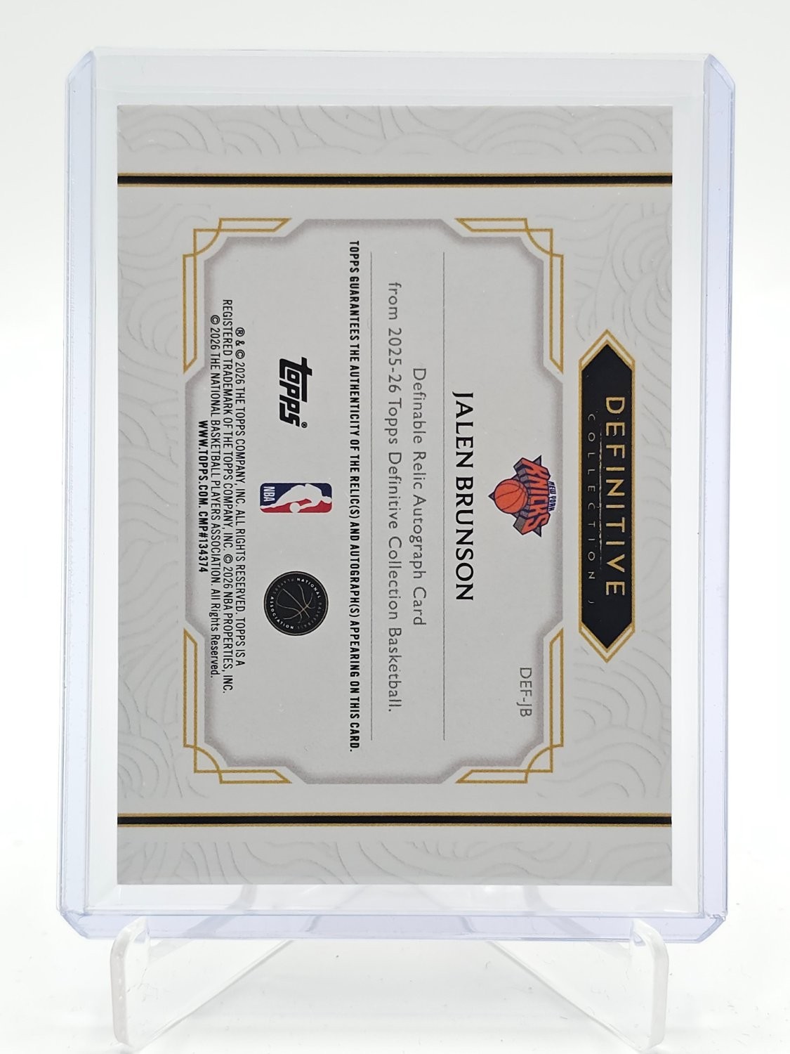 JALEN BRUNSON 2025-26 TOPPS DEFINITIVE DEFINABLE PATCH AUTO ORANGE /25 Q4496 view 2