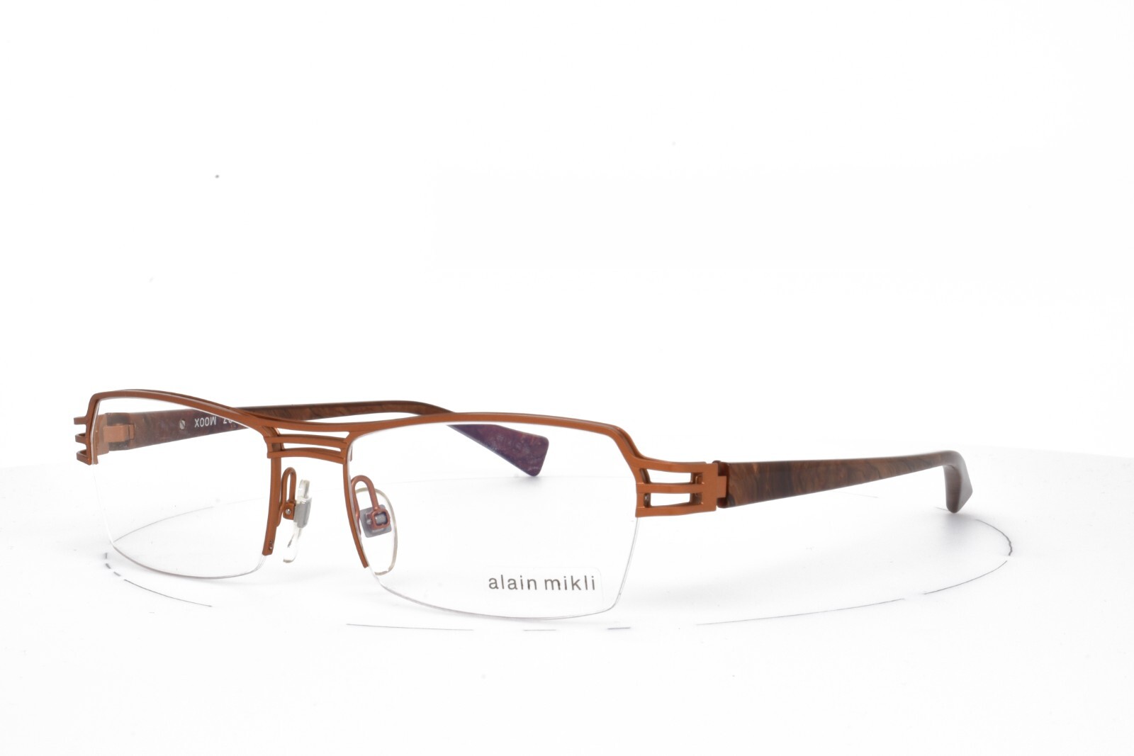 Очки Алена Микли в ТЕМНО-ОРАНЖЕВО-КОРИЧНЕВОЙ ОПРАВЕ С ПОЛОВИННОЙ ОПРАВОЙ 53-17-135 ZQ-1007 30790₽