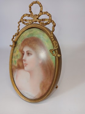 Antique Art Nouveau Hand painted porcelain portrait. Signed Cordelia E. Foster