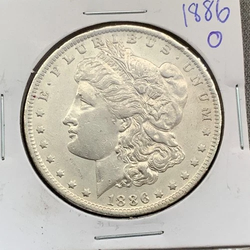 1886 O  Morgan Silver Dollar.  AUBU