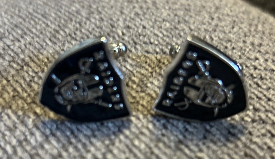 Gemelos de fútbol americano NFL Oakland Raiders Foto 2 de 4