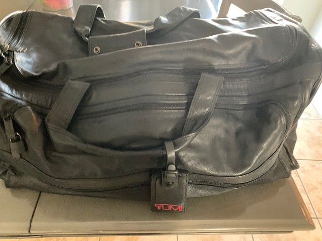 leather rolling duffel bags