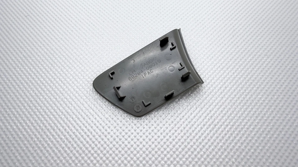 Cubierta de perno de manija interior puerta delantera izquierda Toyota Sienna 2011-2014 69284-08010 OEM Foto 2 de 4