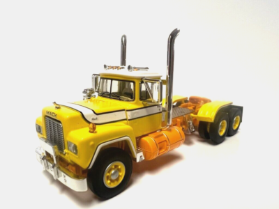 DCP FIRST GEAR 1/64 SCALE R MODEL MACK DAY CAB, YELLOW, ORANGE