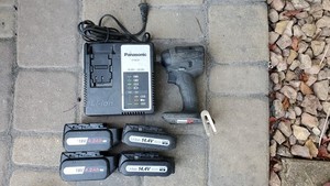 Panasonic EZ75A7 Impact Driver & EYOL81 Charger With 4 Good Batteries