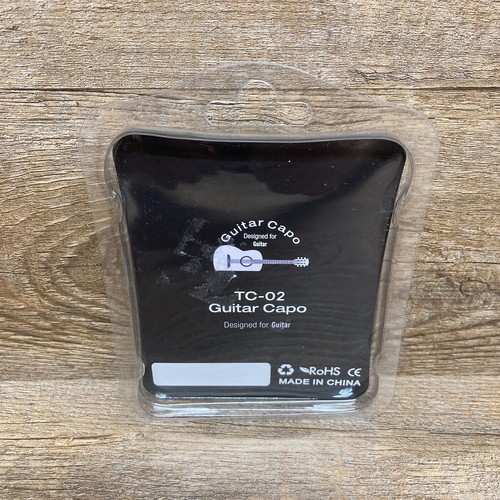 TC-02 Guitar Capo W/3 Guitar Picks Acoustic Clip Color Black Condition Open Box - Picture 2 of 9