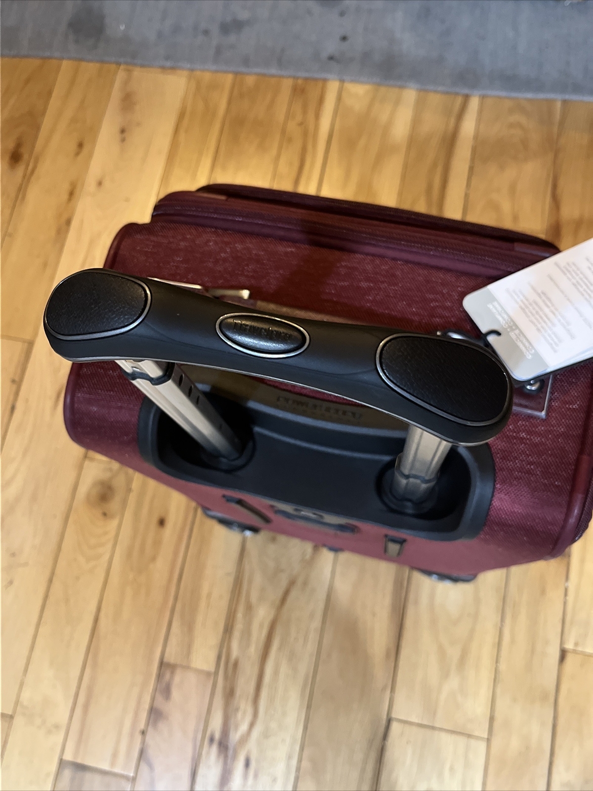 Travelpro Platinum Elite 20in Softside Carry on Luggage 8 Wheel Spinner