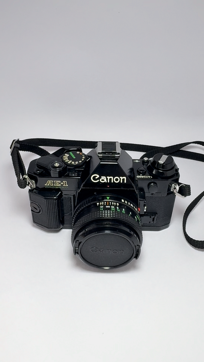 ⏯️ [Near MINT]CANON AE-1 Program Black Film Camera New FD NFD