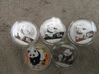 5 assorted Chinese Silver Panda 1oz Coins.-some Asst. Dates