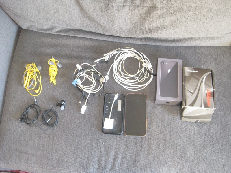 lot of headphones, vires for phones, and cover, and