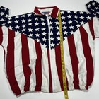 Red, white, and blue vintage jacket with American flag design featuring blue field with white stars and red and white horizontal stripes.