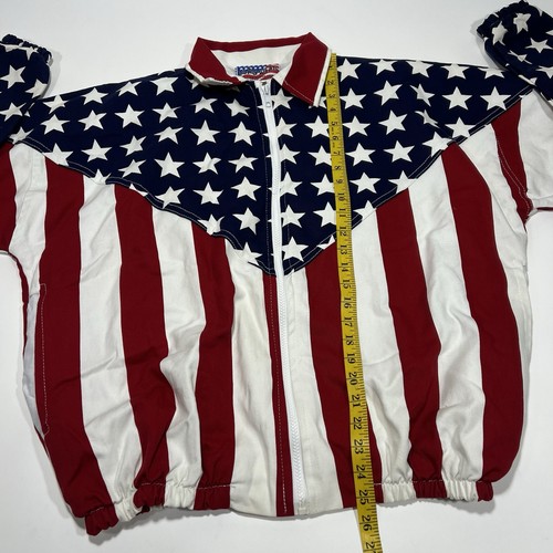 Red, white, and blue vintage jacket with American flag design featuring blue field with white stars and red and white horizontal stripes.