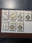 1886, 1896, 1898O, 1900O, 1901O, 1902O, 1904O Morgan Silver Dollars NGC MS64