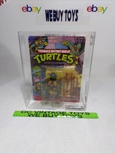 1988 Vintage TMNT MOC 10-Back Ninja Turtles Playmates Donatello CAS 85 GRADED